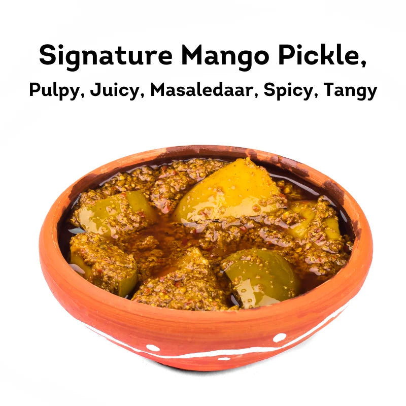 Mango pickle , aam ka achar , pulpy , juicy , masaledar , spicy , tangy